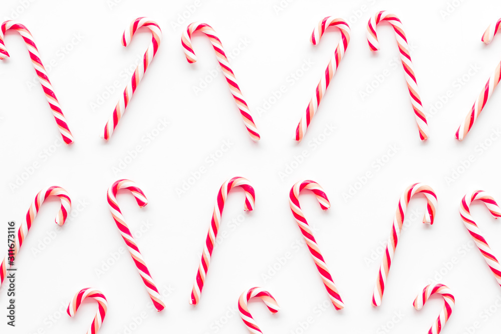 Christmas candy cane pattern on white background top-down