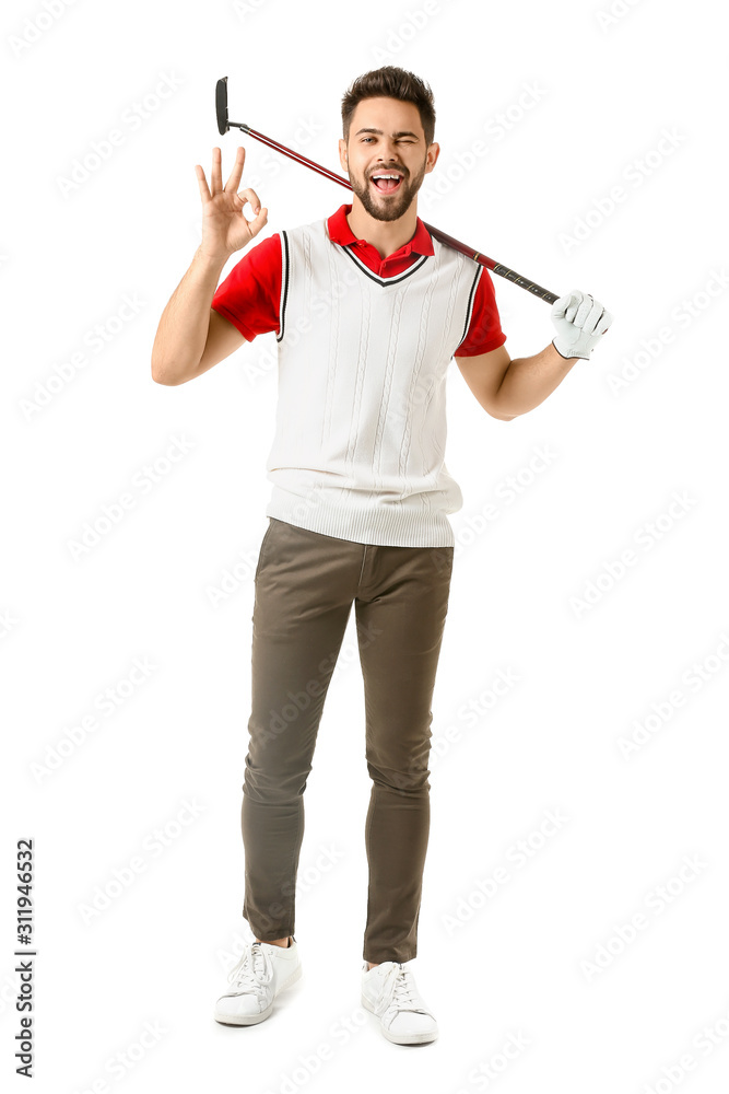 Handsome male golfer showing OK on white background