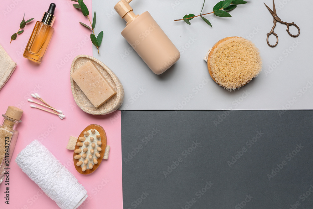 Set of bath accessories on color background