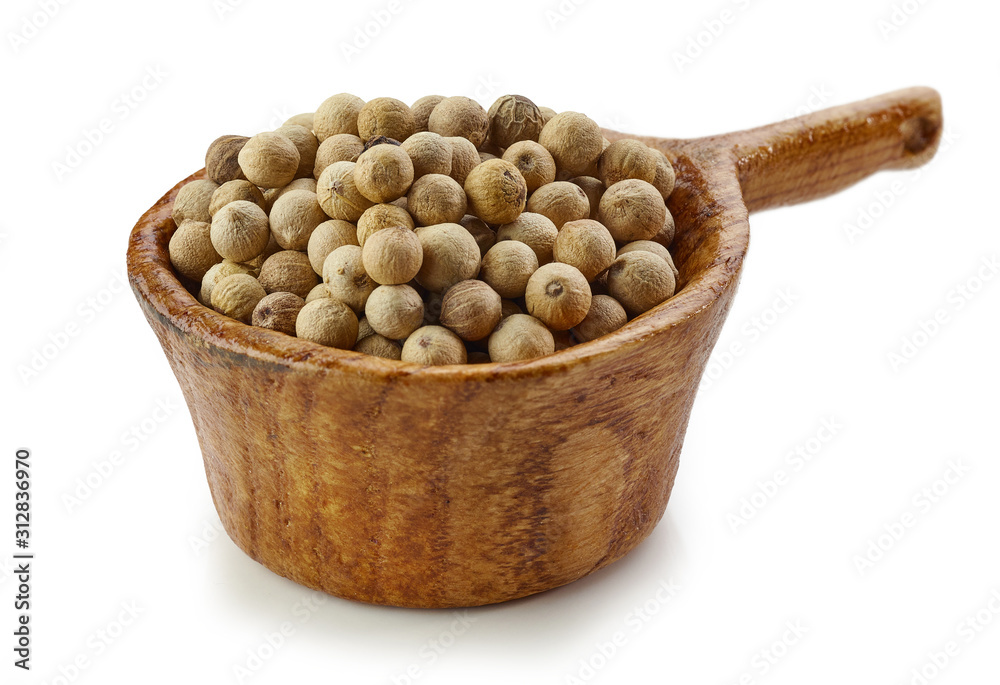 white pepper in wooden cup