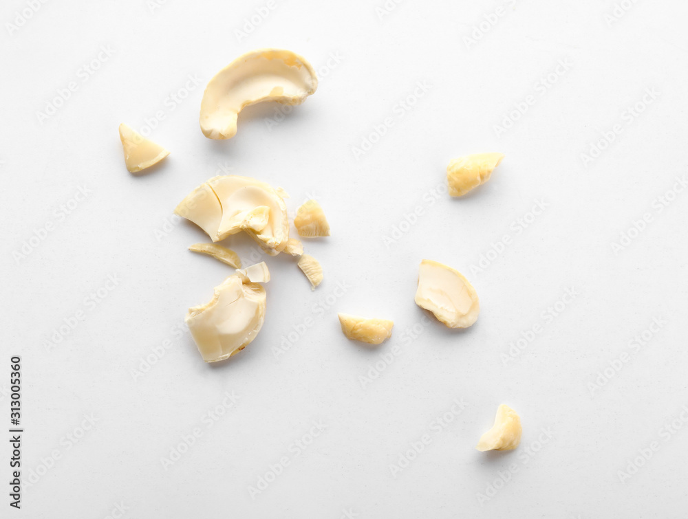 Tasty cashew nuts on white background