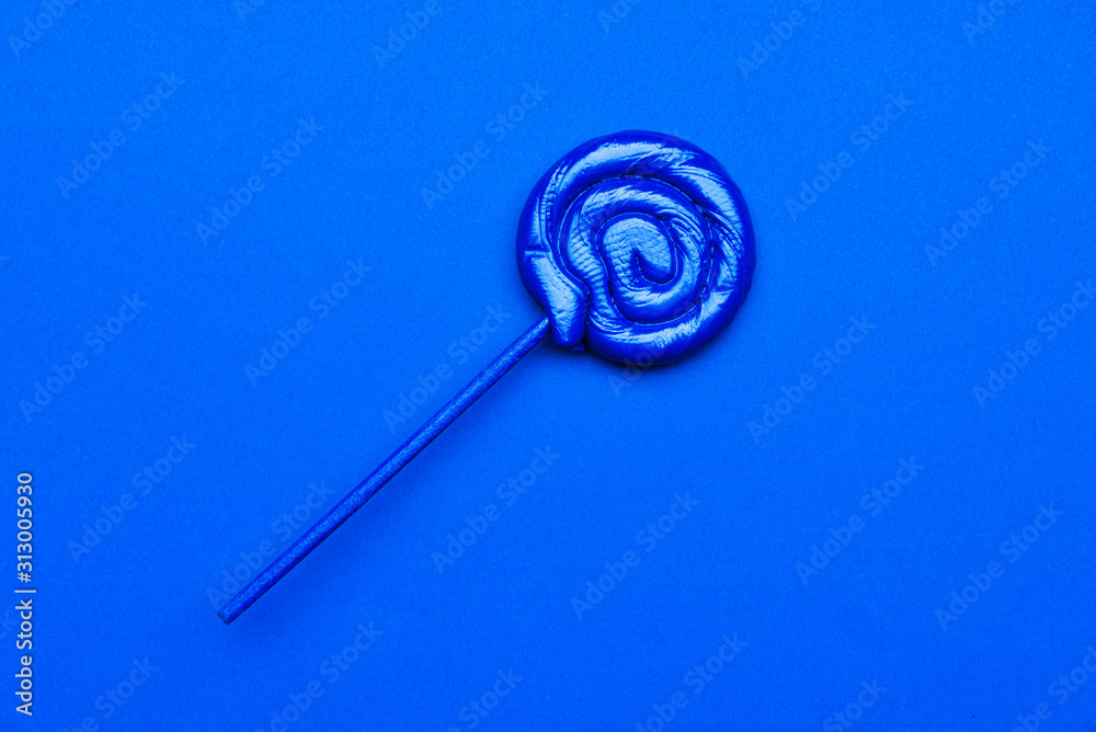 Color lollipop on color background