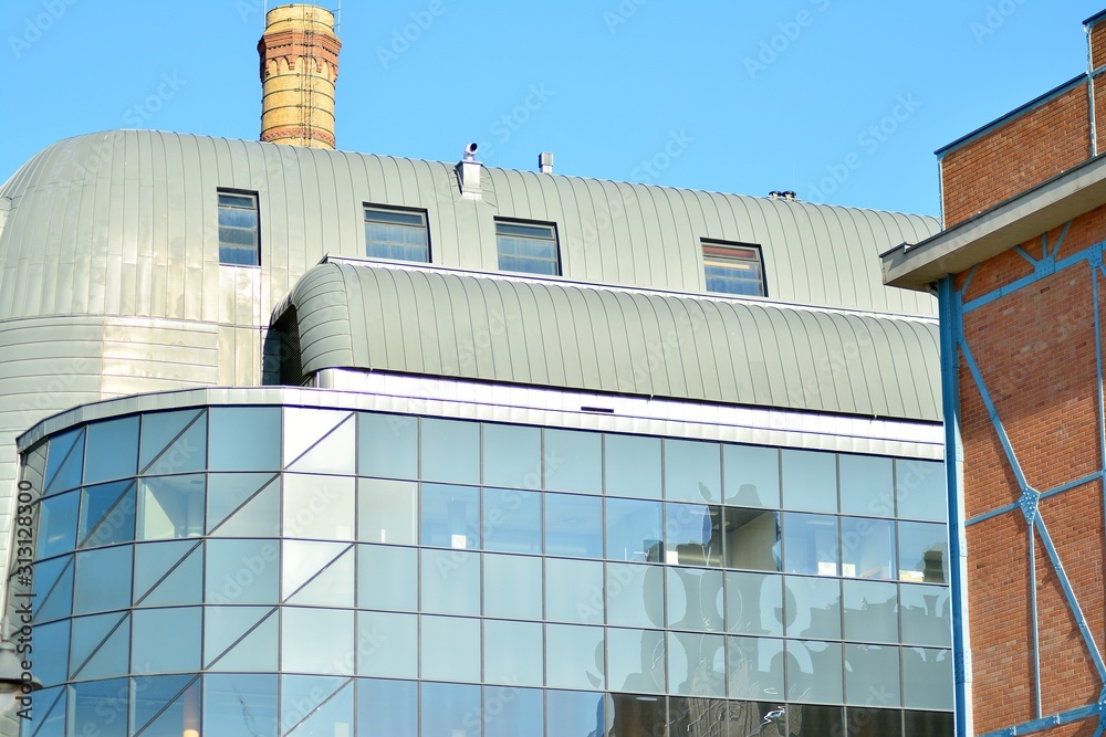 The windows of a modern building for offices. Business buildings architecture.