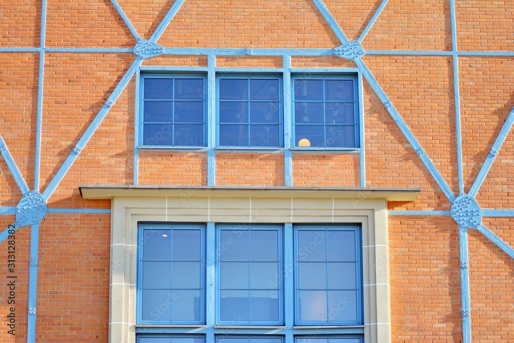 The windows of a modern building for offices. Business buildings architecture.