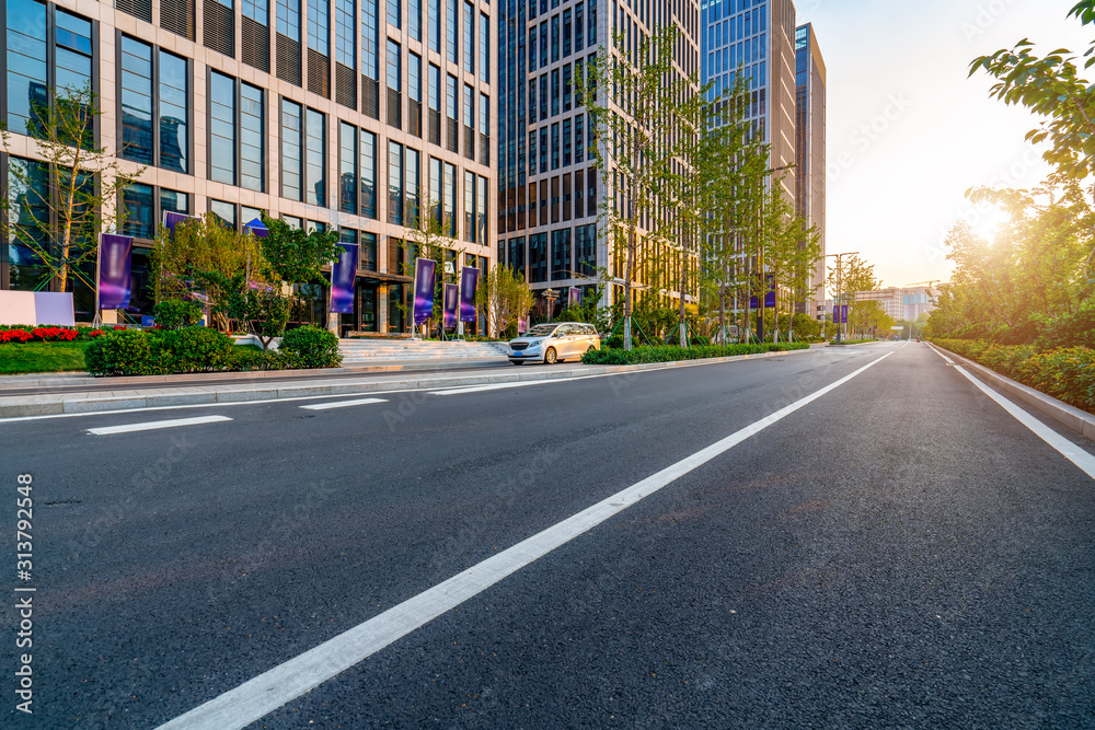 Road pavement and modern building in Jinan financial district