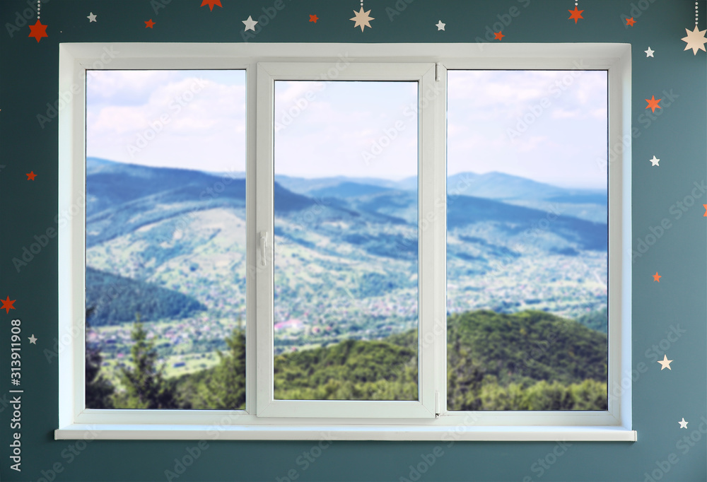 Big modern metal-plastic window in flat