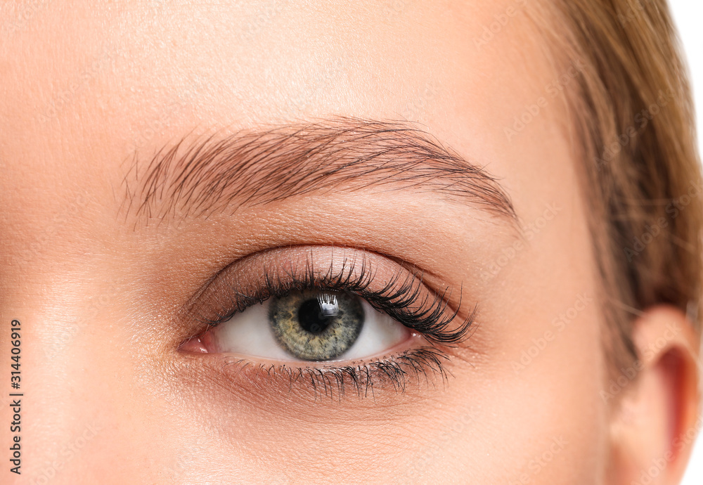 Young woman with beautiful eyebrows, closeup