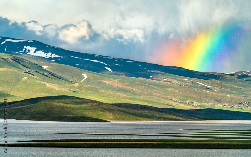 Rainbow above Cat Dam Lake in Turkey