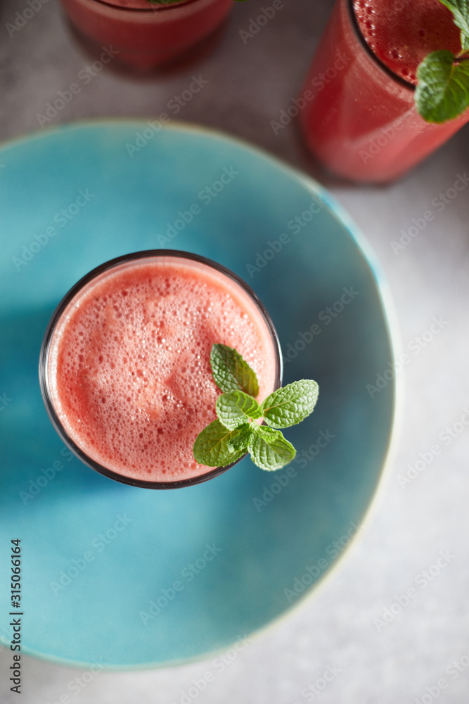 Refreshing watermelon smoothie in the glasses.