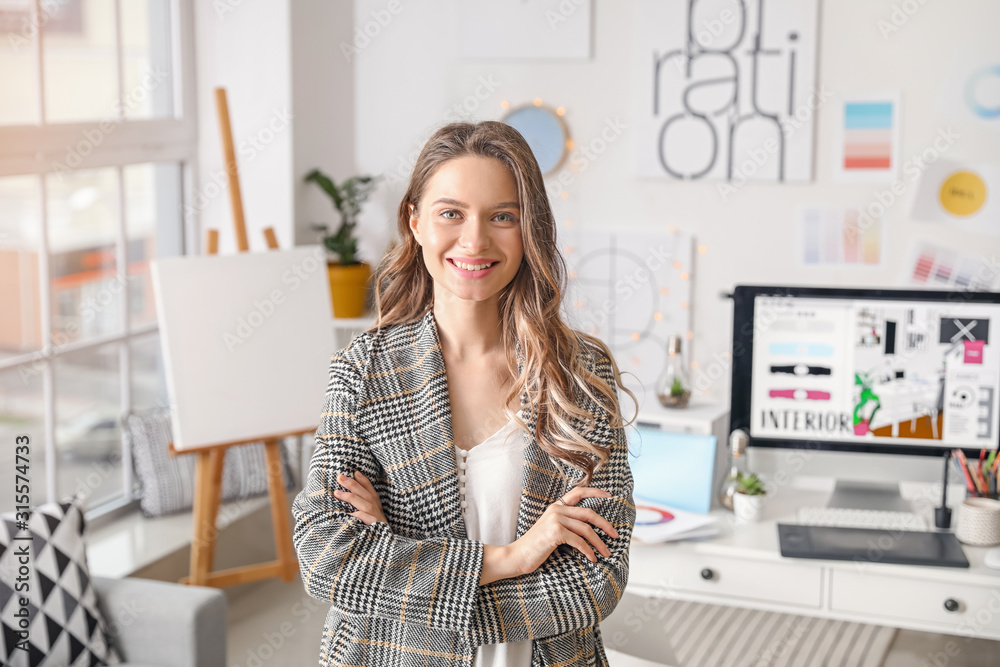 Portrait of female interior designer in office