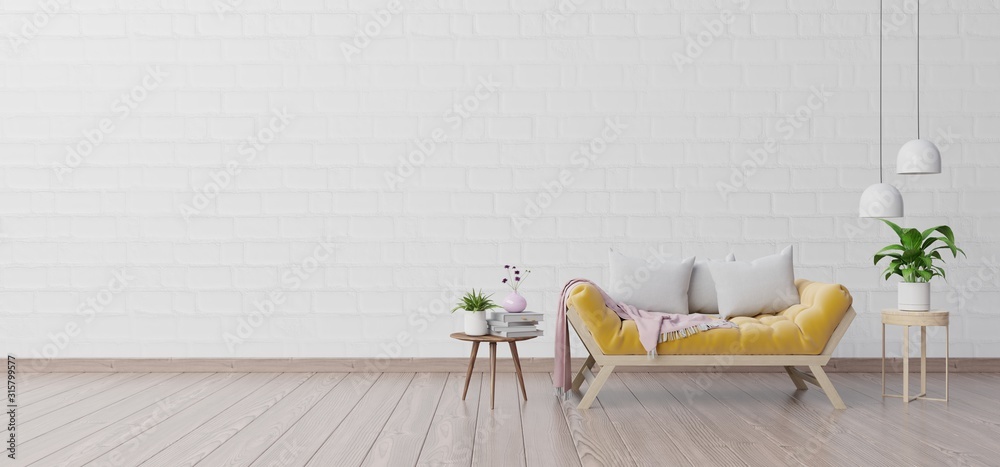 Modern living room interior with sofa and green plants,lamp,table on white wall background.