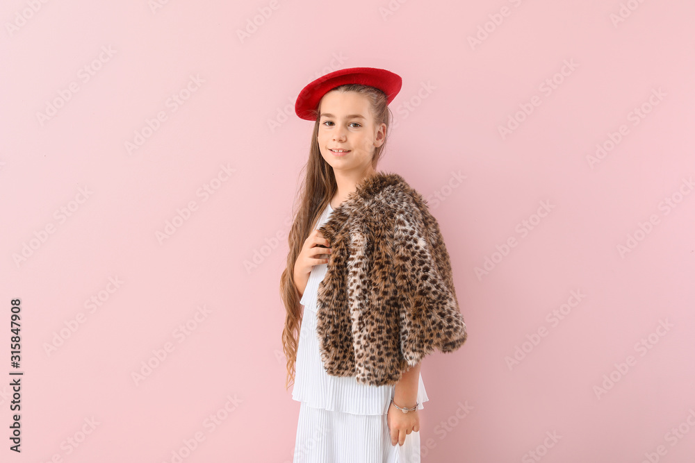 Cute fashionable girl on color background