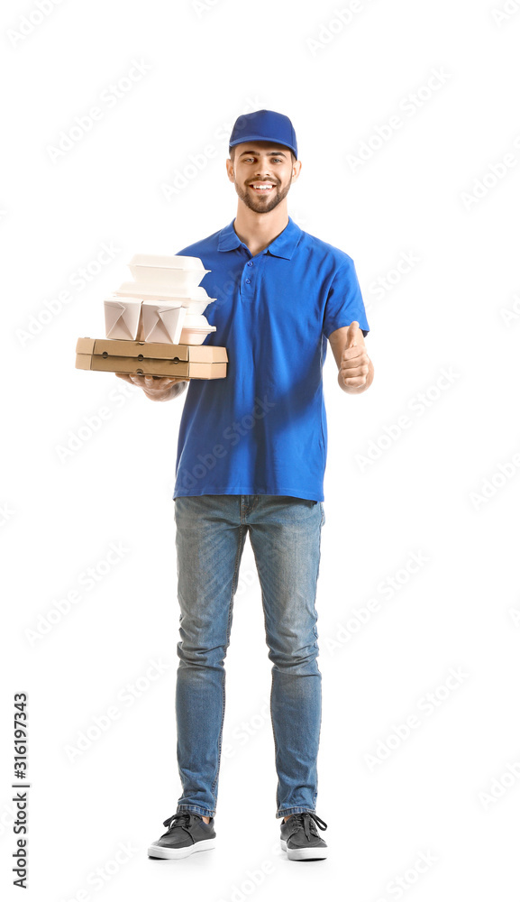 Handsome worker of food delivery service showing thumb-up on white background