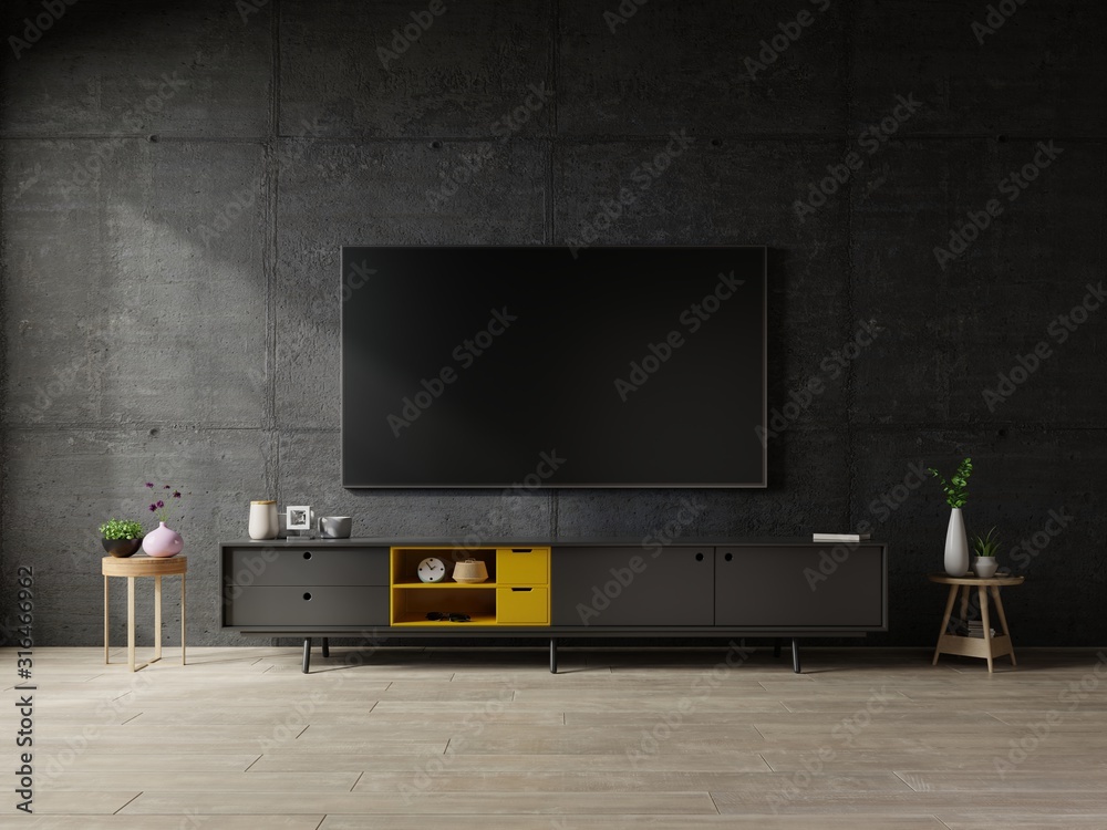 Tv on cabinet the in modern living room the concrete wall.