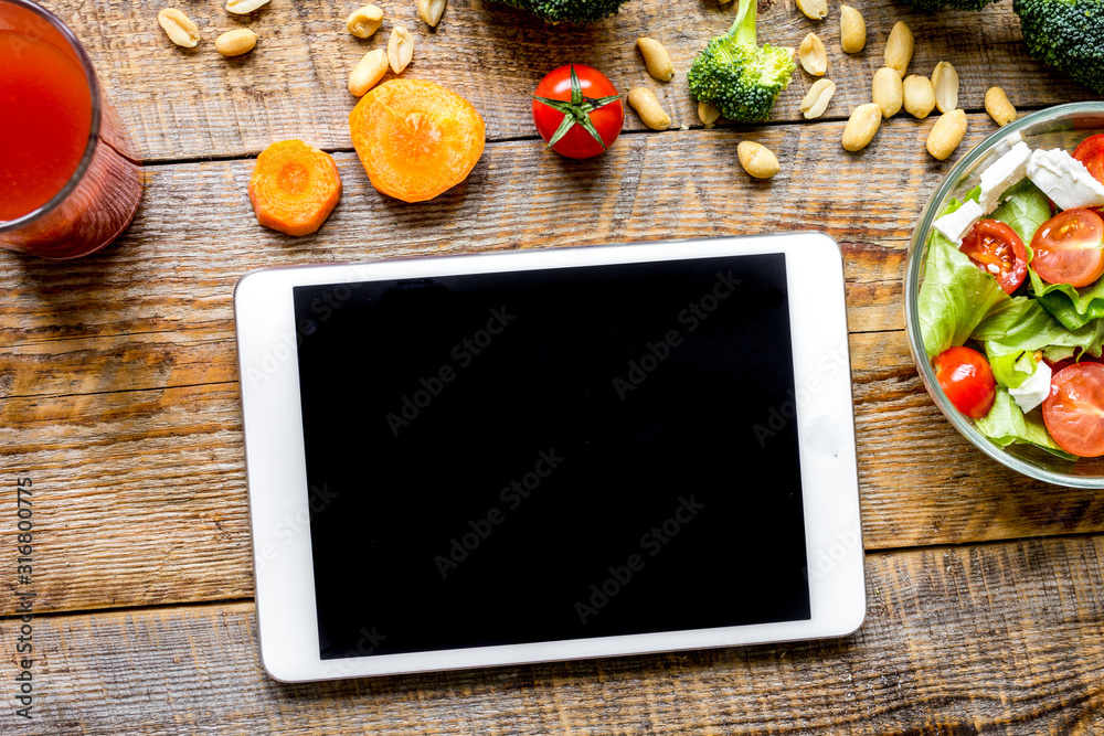 concept diet and tablet with vegetables mock up