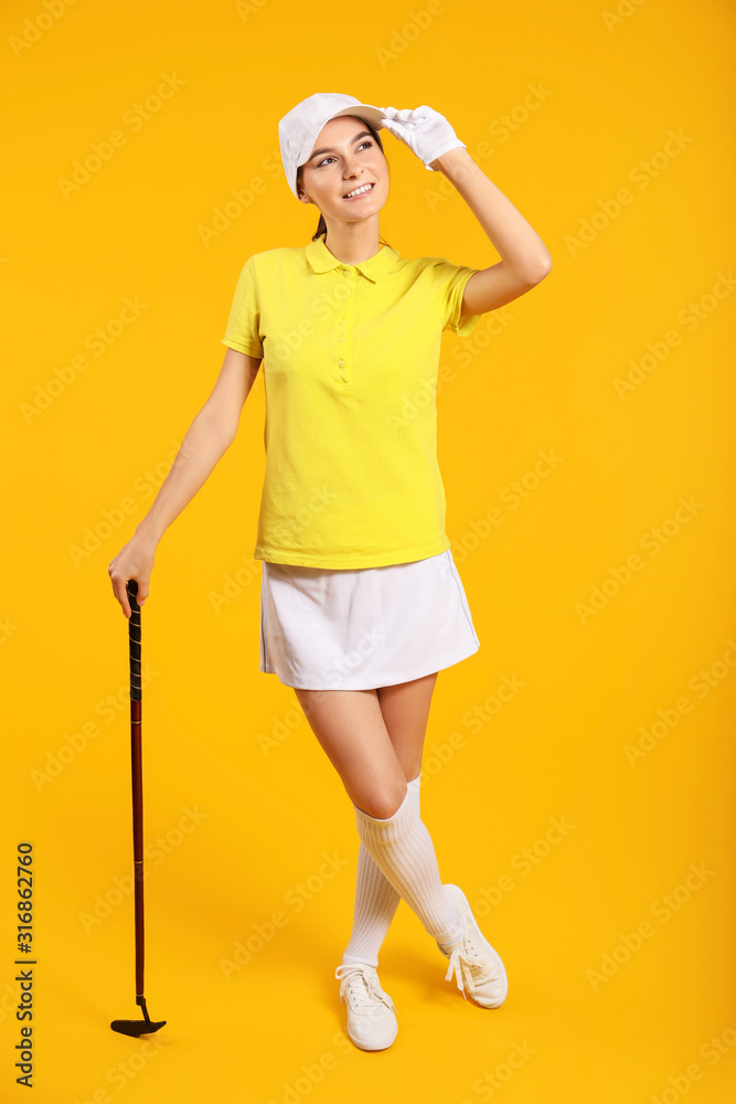 Beautiful female golfer on color background