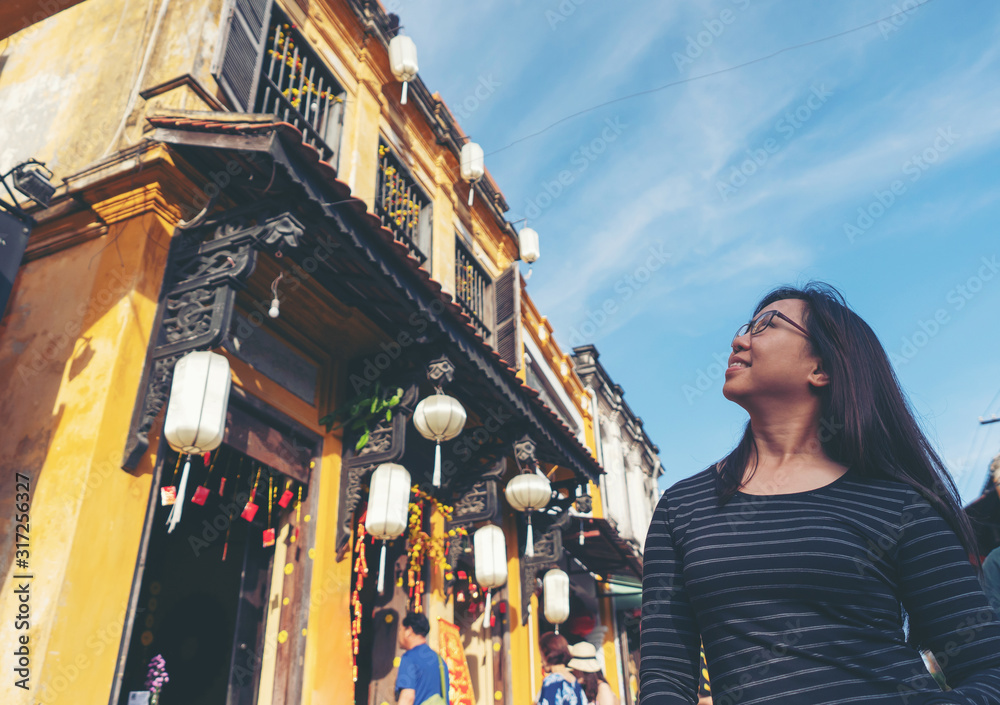 woman in Hoi An ancient town