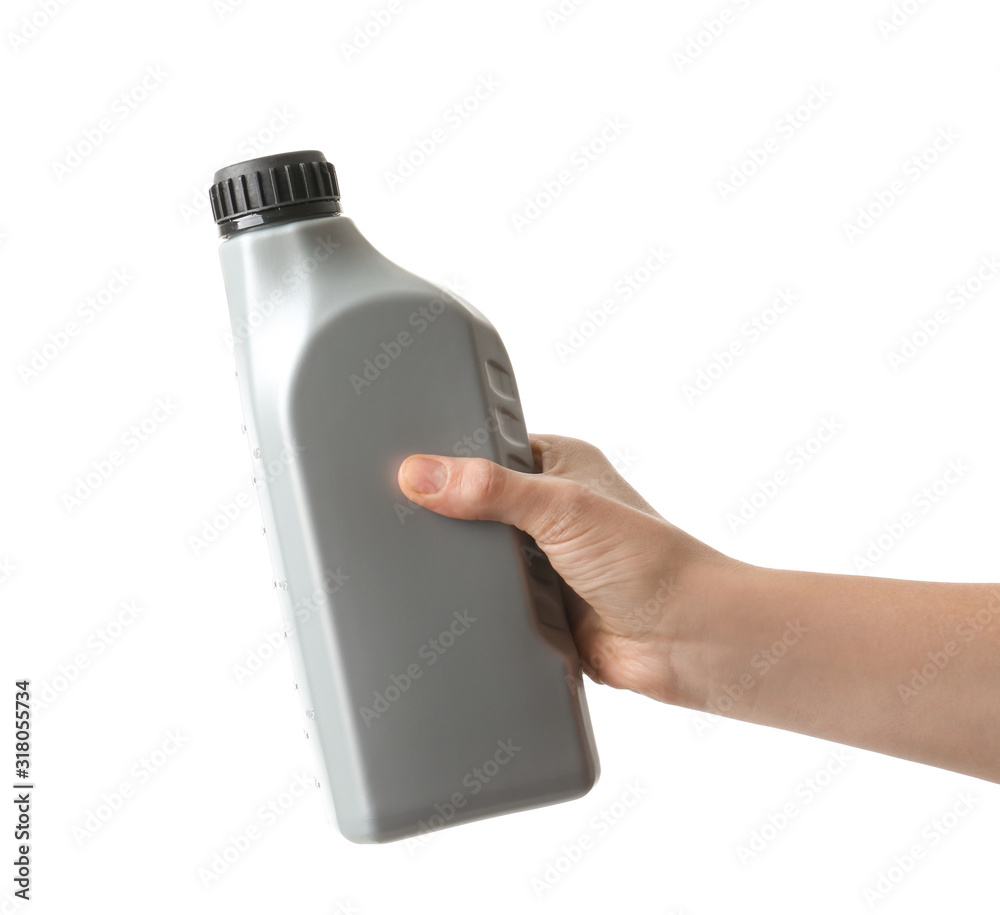 Hand with car oil in canister on white background