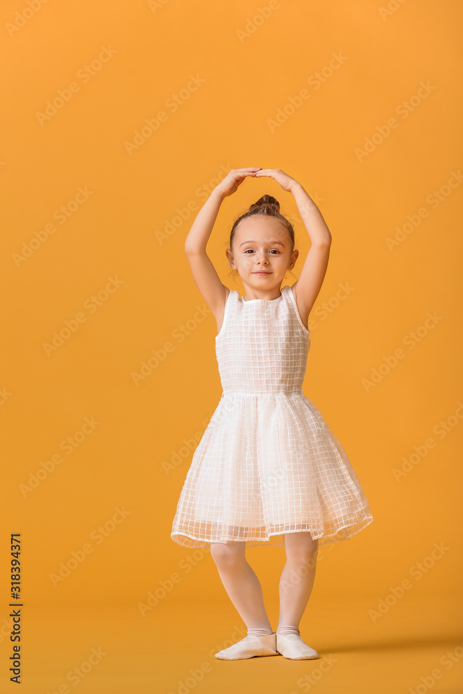 Cute little ballerina on color background