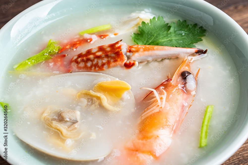 Chinese Chaoshan casserole porridge, shrimp and crab seafood porridge closeup