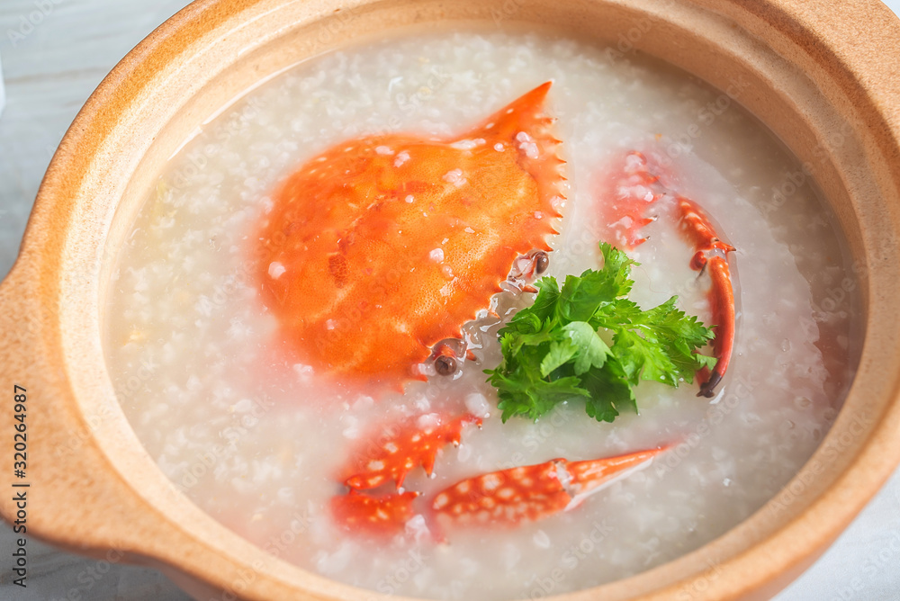 Chinese Chaoshan casserole porridge, a pot of shrimp and crab seafood porridge on the kitchen counte