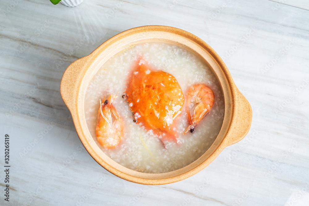 Chinese Chaoshan casserole porridge, a pot of shrimp and crab seafood porridge on the kitchen counte