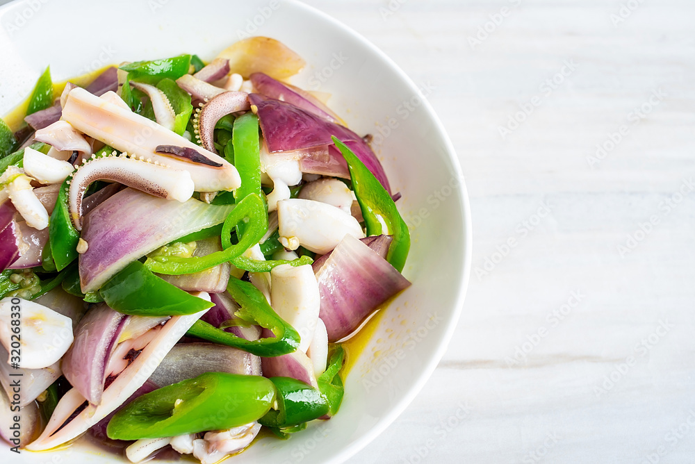 Chinese regular dish fried squid with onion and green pepper