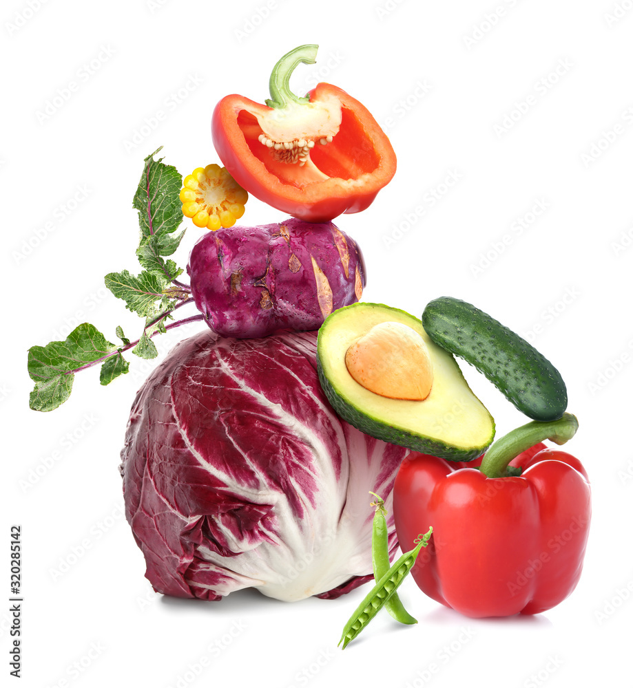 Assortment of fresh vegetables on white background