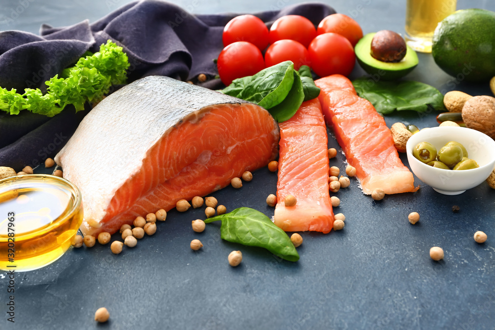 Healthy products rich in omega-3 on color background