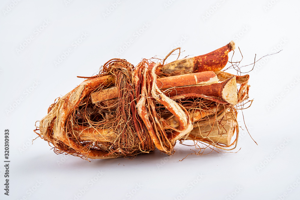 A bunch of dried five-fingered peaches on white background