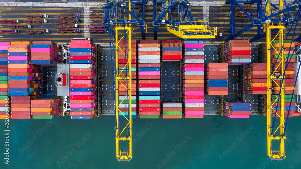 Container Cargo freight ship with working crane loading bridge, Container ship loading and unloading