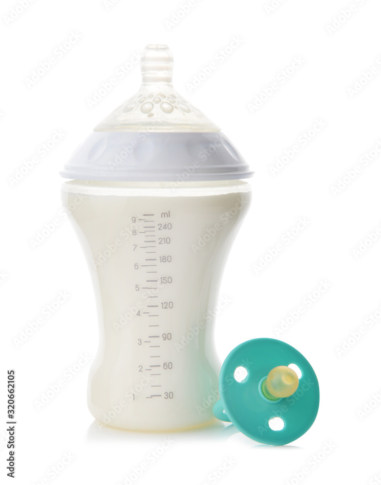 Bottle of milk for baby with pacifier on white background