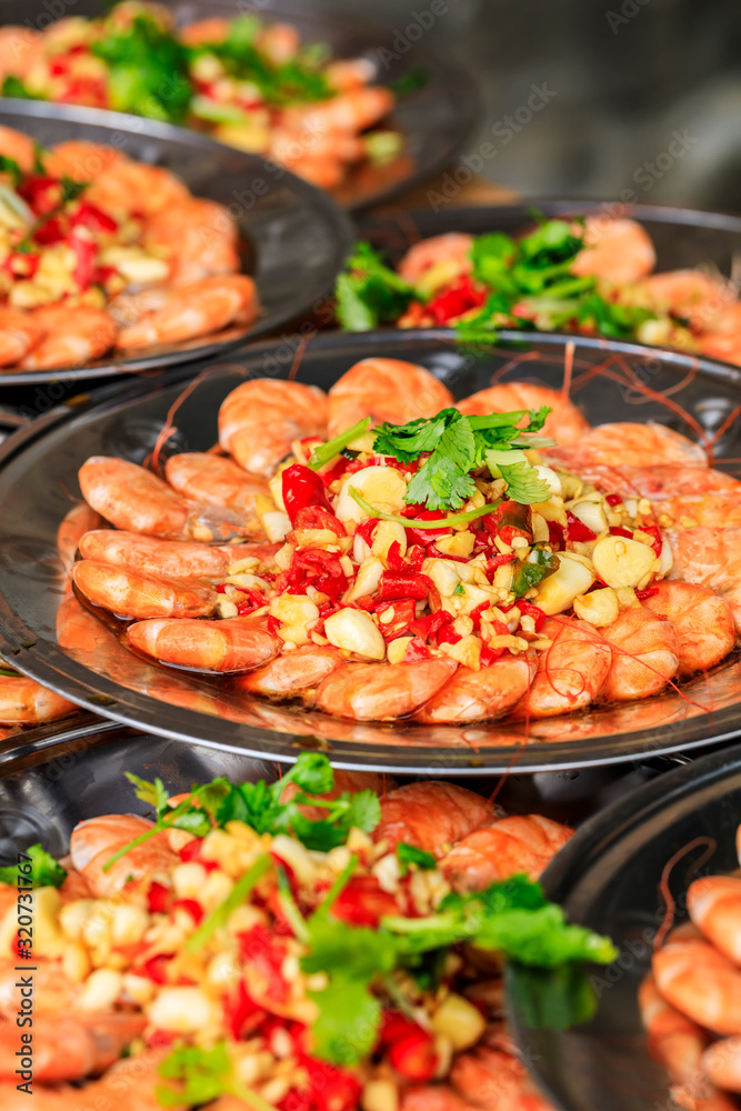 Delicious chinese food poached shrimp,ingredients are coriander and garlic with chili.