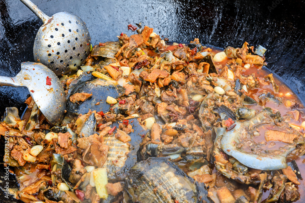 Delicious braised turtle in a pan,Chinese traditional cuisine.