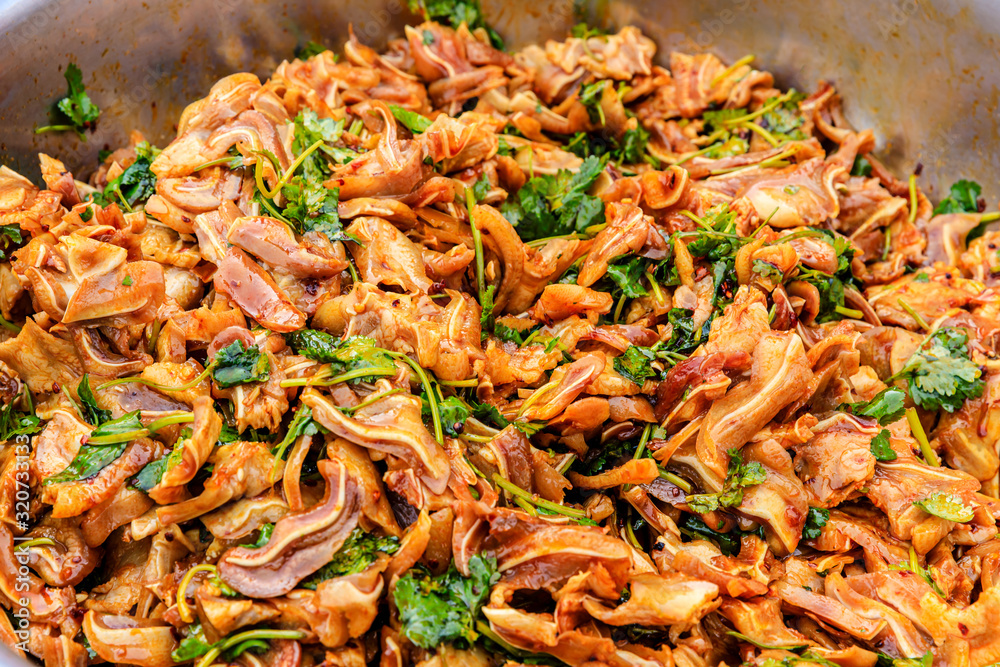 Delicious pork ears snack in the bowl,Chinese food.