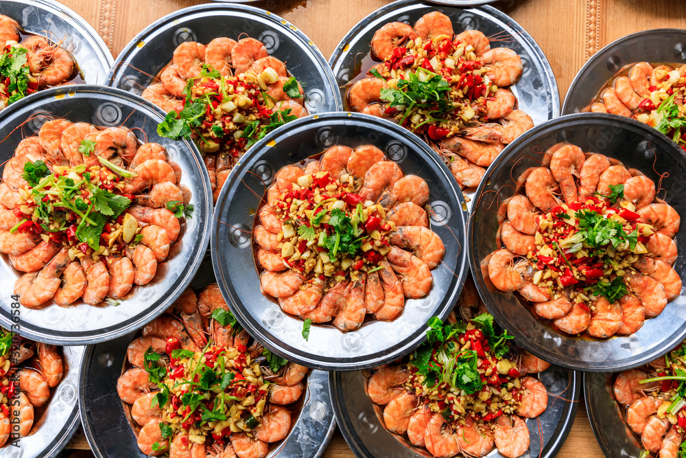 Delicious chinese food poached shrimp,ingredients are coriander and garlic with chili,top view.