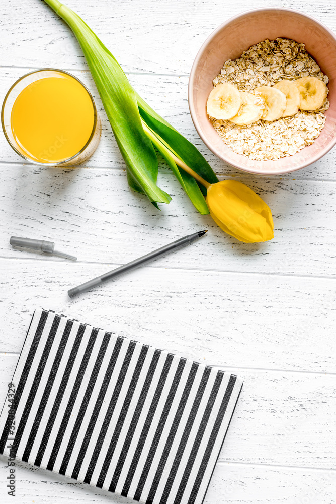 healthy breakfast with porridge on wooden background top view