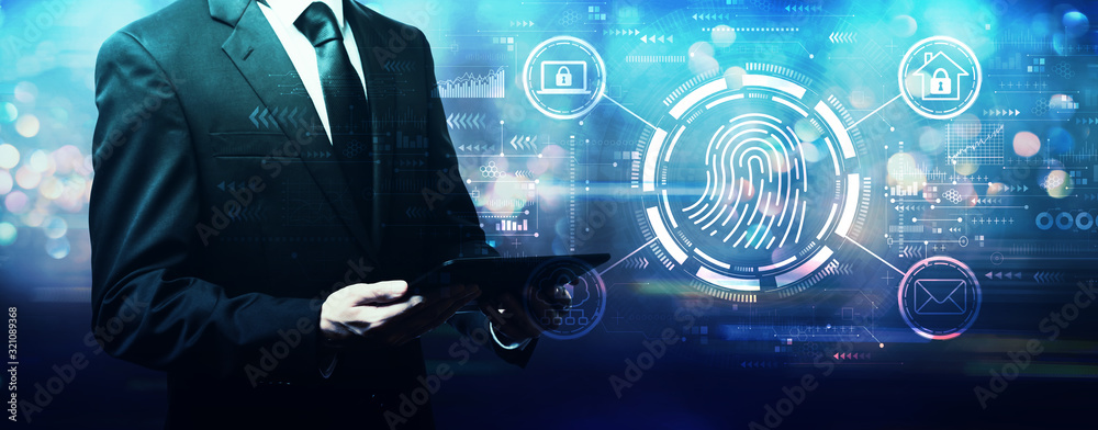 Fingerprint scanning theme with businessman holding a tablet computer