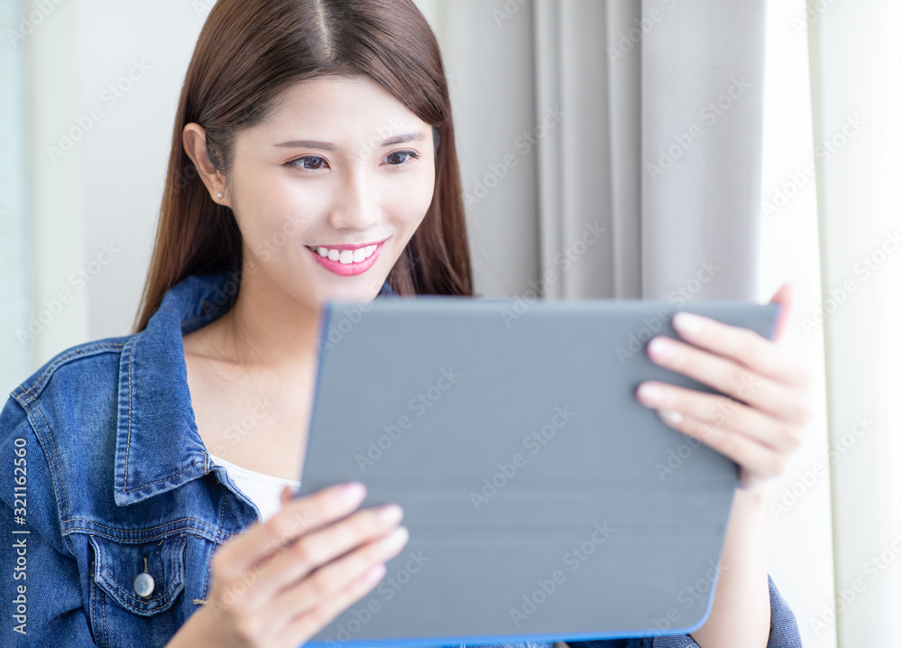 Asian Woman Use Tablet