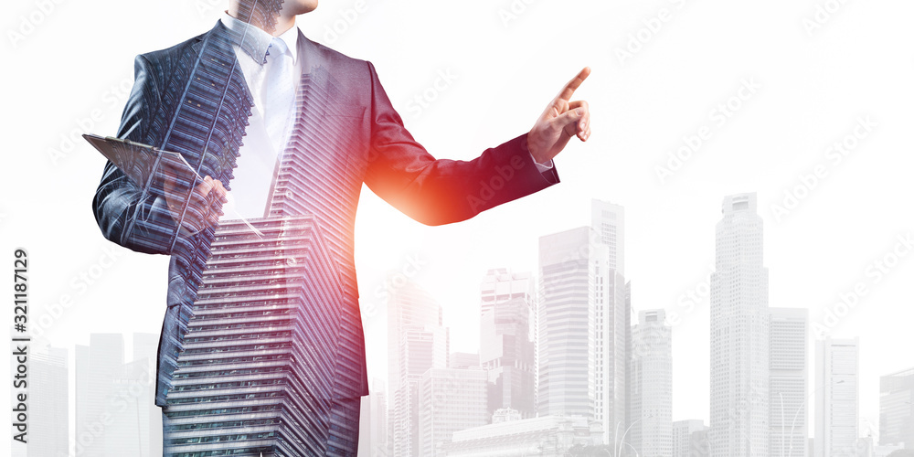 Businessman pointing on empty space