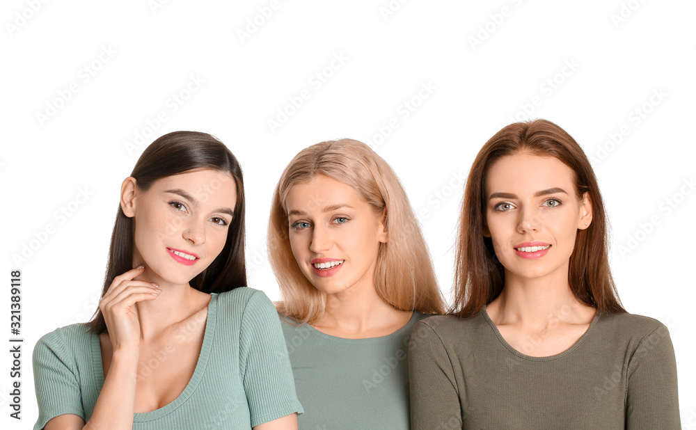 Young women with beautiful makeup on white background