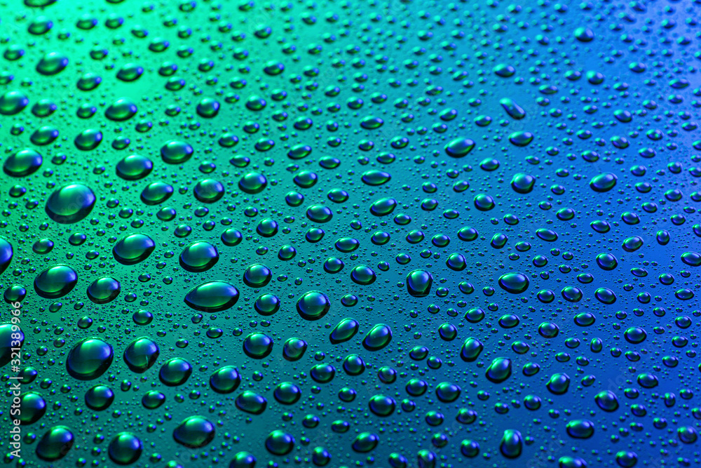 Water drops on color background