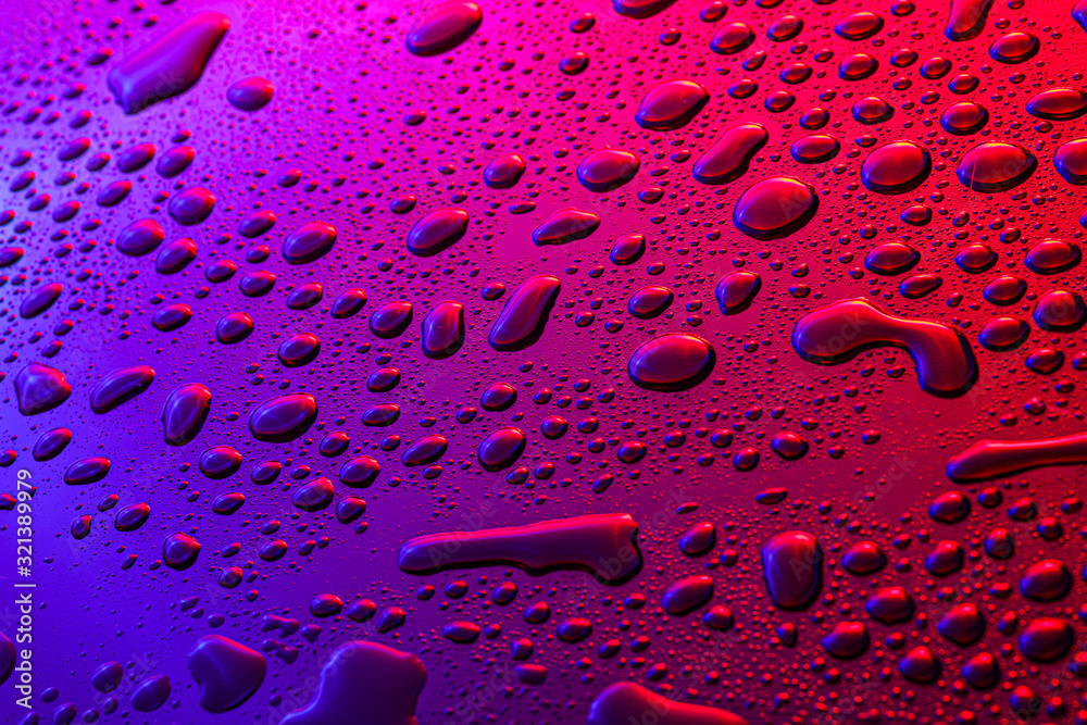 Water drops on color background