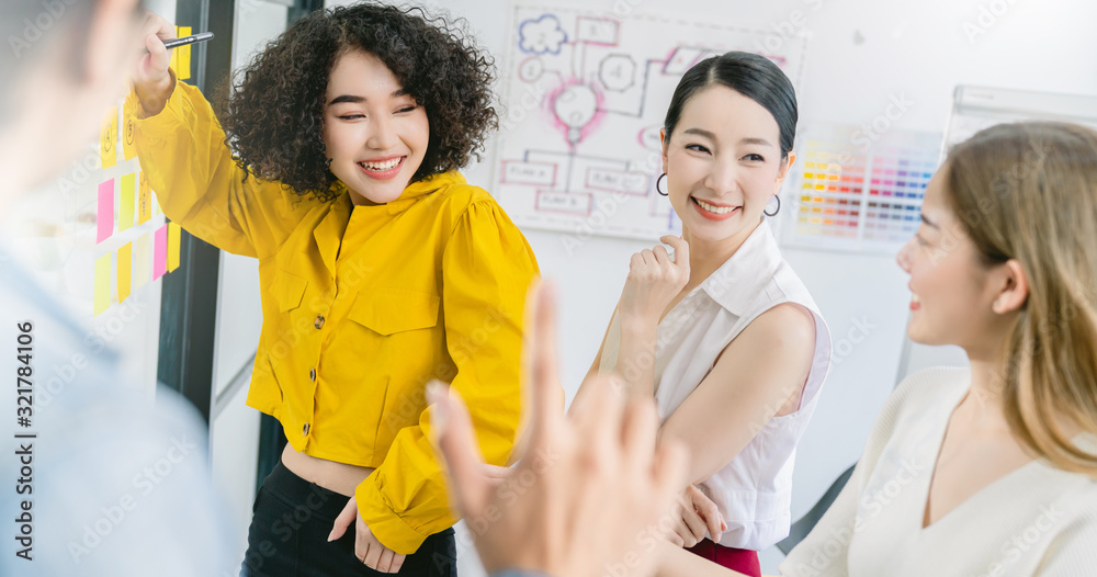 Group of asian young creative happy people entrepreneur on a business meeting office background Good