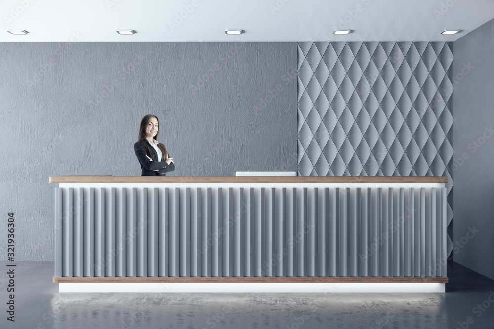 Businesswoman standing in hotel hall