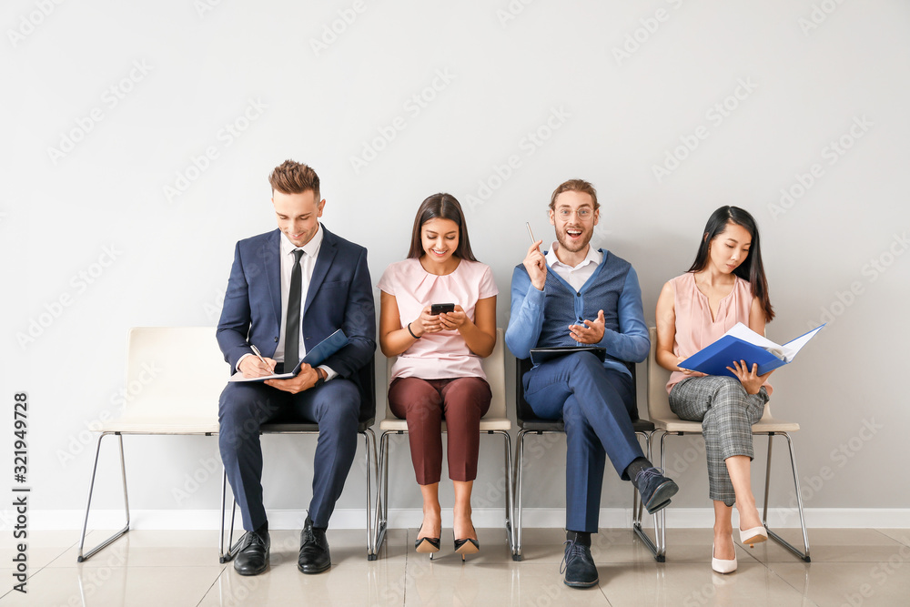 Young people waiting for job interview indoors