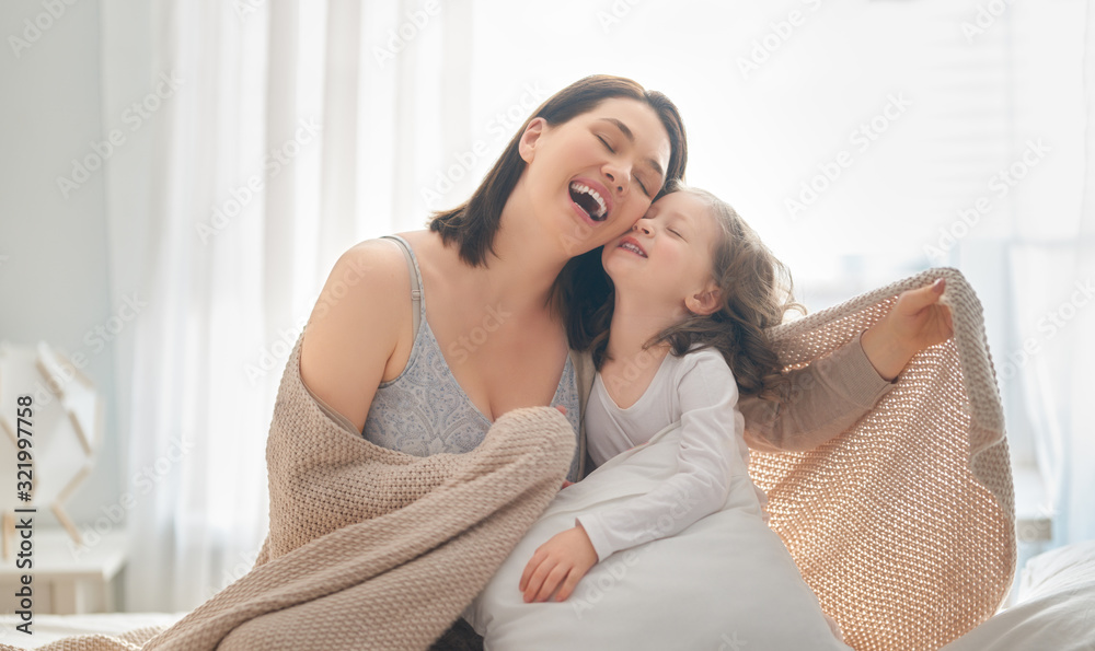 girl and her mother enjoy sunny morning