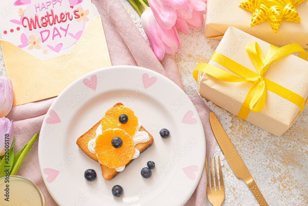 Composition with tasty breakfast for Mothers Day