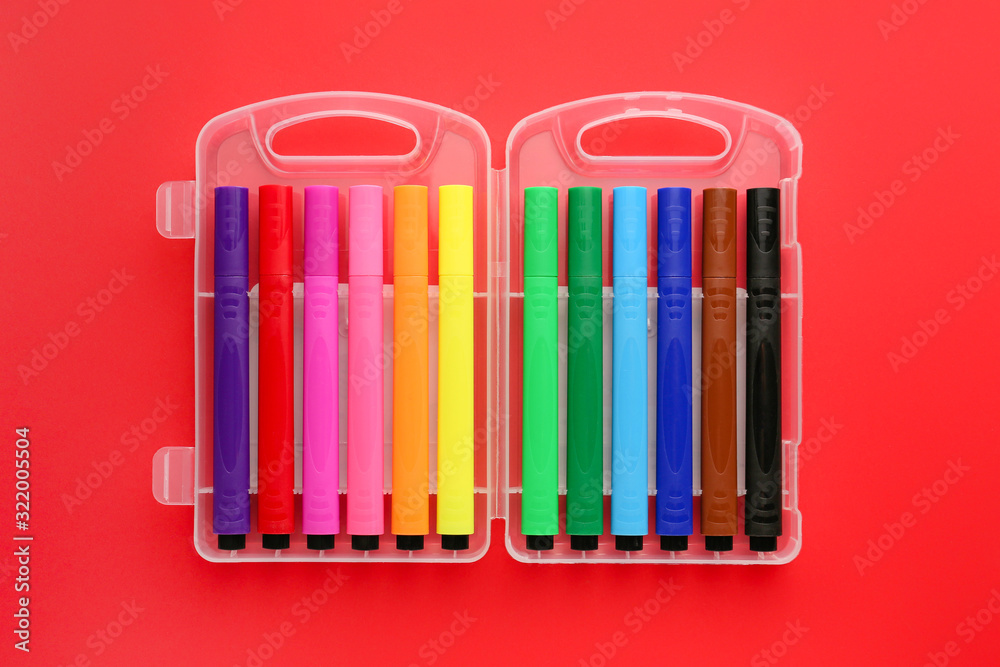 Set of felt-tip pens on color background