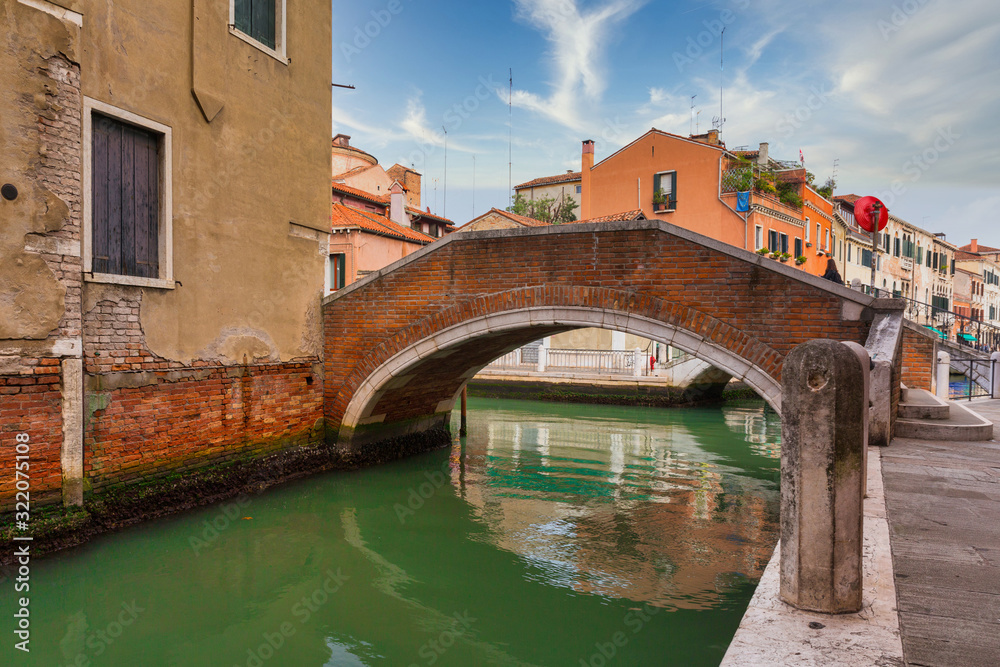 Canals of Venice city with traditional colorful architecture, Italy